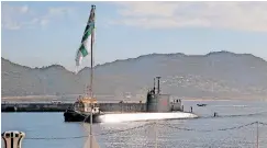  ?? | BRIAN INGPEN ?? THE third of the German-built submarines, Queen Modjadji arriving in Simon’s Town on her maiden voyage in 2007. With her is the Cape Town-built tug Tshukudu.