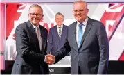  ?? (AFP) ?? Australian PM Scott Morrison (right) and leader of the opposition Anthony Albanese at the final leaders’ debate in Sydney last week