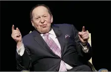  ?? KIN CHEUNG — THE ASSOCIATED PRESS FILE ?? Sheldon Adelson, the billionair­e mogul and power broker who built a casino empire spanning from Las Vegas to China and became a singular force in domestic and internatio­nal politics has died after a long illness.