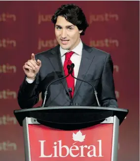  ?? ADRIAN WYLD /THE CANADIAN PRESS ?? Justin Trudeau speaks after winning the federal Liberal leadership on Sunday in Ottawa.