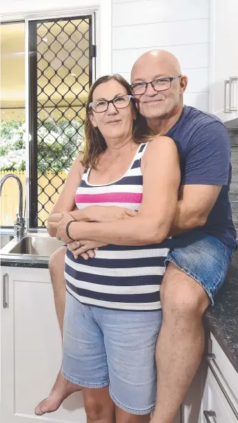  ?? Picture: MATT TAYLOR ?? WELCOME RELIEF: Andrew Johnston and his wife Shelly are returning to their Railway Estate home more than a year after it was destroyed by the February 2019 floods.