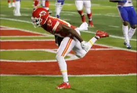  ?? Jamie Squire/Getty Images ?? Chiefs wide receiver Mecole Hardman scores from three yards in the second quarter on a pass from Patrick Mahomes.