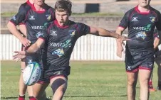  ??  ?? Arthur Marais looks to find touch for the Gatton Blackpigs at Heritage Oval.