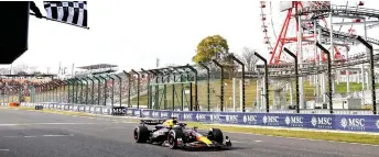  ?? — AFP photo ?? Verstappen wins the Formula One Japanese Grand Prix race at the Suzuka circuit in Suzuka.
