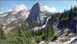  ?? Guy Mccarthy / Union Democrat ?? Clouds Rest and Half Dome are visible abovetenay­a Lake from a rising granite buttress on Polly Dome inyosemite National Park in June 2018 (top). El Capitan, Half Dome and Bridalveil Fall are visible in March 2019 from Old Big Oak Flat Road in Yosemite Valley (center). The backside of Half Dome, Mount Broderick and Liberty Cap stand mute while Nevada Fall churns toward Vernal Fall in June 2017 (above).