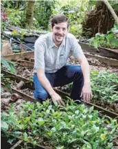  ?? — Timothy Heinze ?? Timothy Heinze works on a coffee farm in Yunnan Province.