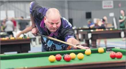  ?? Pictures: PAUL CARRACHER ?? CHANCE: Anthony Hill of Horsham, above, plays in the tournament at the weekend; while Horsham’s White Hart Hotel player Craig Barnett, below, tries his hand at a shot.