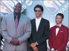  ?? PHOTO BY RICHARD SHOTWELL — INVISION — AP ?? Shaquille O’Neal, from left, and his sons Shareef O’Neal and Shaqir O’Neal arrive at the NBA Awards on Monday at the Barker Hangar in Santa Monica, Calif.