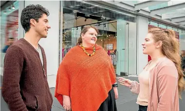  ??  ?? University of Auckland masters students Reuben Yates (left) and Ellinor King (right) with their deputy head of school Andrea Mead. Yates and King looked at young shoppers’ habits to find out why they bought clothes that conflicted with their ethics.
