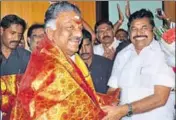  ?? HT PHOTO ?? O Panneersel­vam with Tamil Nadu CM Edappadi K Palanisami during his oath ceremony in Chennai on Monday.