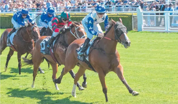 ?? Picture: AAP ?? TOP RUN: Jockey Jason Collett (right) wins race 5 riding Crack Me Up in the Liverpool City Cup during TAB Chipping Norton Stakes Day at Randwick on March 3.