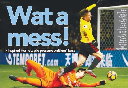  ??  ?? Chelsea goalkeeper Thibaut Courtois fouls Watford winger Gerard Deulofeu to concede a penalty during yesterday’s Premier League match at Vicarage Road . – REUTERSPIX