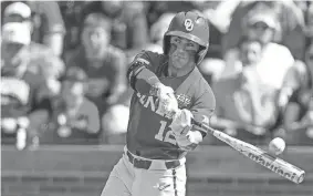  ?? NATHAN J. FISH/THE OKLAHOMAN ?? Oklahoma outfielder Bryce Madron hits a foul ball during a Bedlam game against the Oklahoma State Cowboys at L. Dale Mitchell Park in Norman on May 20, 2023.