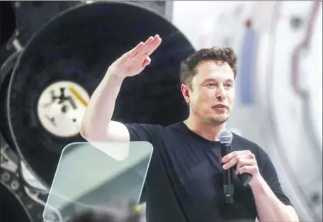  ?? MARIO TAMA/GETTY IMAGES/AFP ?? Elon Musk speaks at a press conference at SpaceX headquarte­rs where he announced the Japanese billionair­e chosen by the company to fly around the moon, on September 17 in Hawthorne, California.