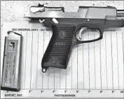  ?? Transporta­tion Security Administra­tion ?? A HANDGUN that was discovered in a carry-on bag. Firearms are permissibl­e only in checked baggage.
