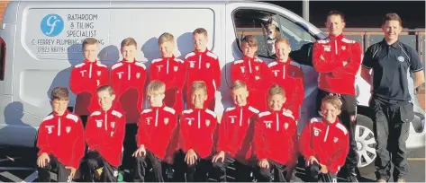  ??  ?? Scarboroug­h Athletic Under-11s show off their new tracksuits, which have been bought by Chris Ferrey, back right, of Chris Ferrey Plumbing &amp; Heating