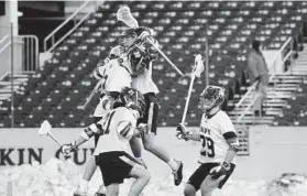  ?? W. GILLESPIE/CAPITAL GAZETTE PAUL ?? Navy celebrates a goal by Jack Sweeney in the second quarter of Saturday’s season-opening 8-5 victory over Mount St. Mary’s at Navy-Marine Corps Memorial Stadium in Annapolis.