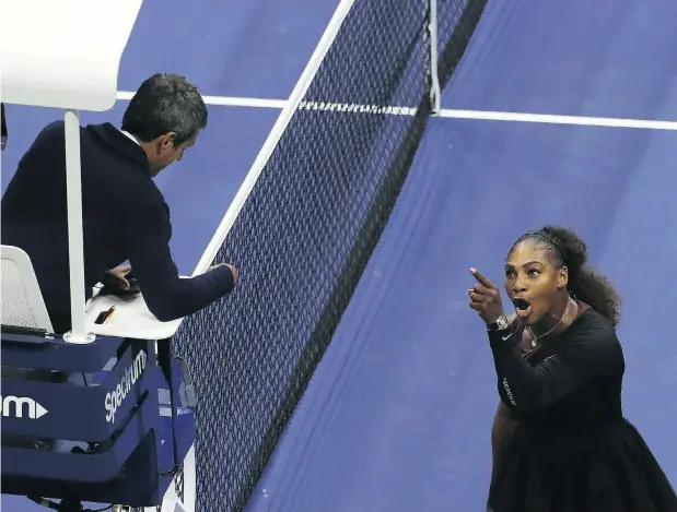  ?? JAIME LAWSON / GETTY IMAGES FOR USTA ?? Serena Williams argues with chair umpire Carlos Ramos during her U.S. Open final against Naomi Osaka on Saturday. Williams was penalized a full game for her actions.