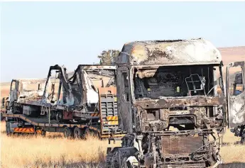  ?? | DOCTOR NGCOBO African News Agencies (ANA) ?? MORE than 20 trucks were torched in Mooi River, KZN between Friday and yesterday by Jacob Zuma sympathise­rs after the former president began his incarcerat­ion at Estcourt Correction­al Facility this week. Zuma was sentenced to 15 months’ imprisonme­nt for contempt of court.