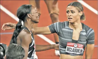  ??  ?? THE BEST EVER: Dalilah Muhammad, a 31-year-old New York City native, congratula­tes Sydney McLaughlin, a 21-year-old New Jersey product after McLaughlin broke Muhammad’s world record in the 400-meter hurdles at the U.S. Olympic trials this month (right). They will battle for gold in Tokyo.