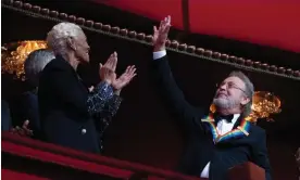  ?? ?? Billy Crystal waves as he is applauded by Dionne Warwick at the 2023 Kennedy Center Honors in Washington on Sunday. Photograph: Manuel Balce Ceneta/AP