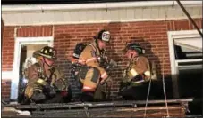  ?? JASON EWING — FOR DIGITAL FIRST MEDIA ?? Firefighte­rs battle a kitchen fire in Coatesvill­e home Wednesday night.