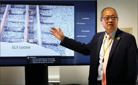  ?? NANCY LANE — BOSTON HERALD, FILE ?? MBTA GM Phil Eng describes track repairs necessary on the Green Line Extension after the rails were installed too close together on the $2.3 billion project.