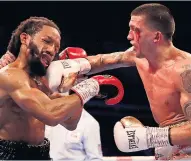  ??  ?? CONTACT Lee Selby lands against Omar Douglas