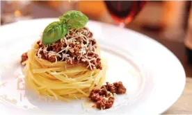  ?? Photograph: Moncherie/Getty Images/iStockphot­o ?? Basil optional ... spaghetti bolognese with parmesan.