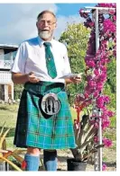  ??  ?? Henderson, far left, with beekeeping equipment; left, he loved to hitchhike and said that wearing a kilt was the easiest way to guarantee a lift. Below, second right, on a stamp celebratin­g Nevis’s honey production