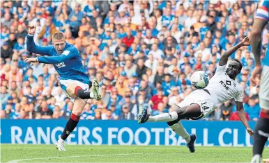  ?? ?? John Lundstram scores the opening goal for Rangers