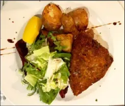  ?? ?? Pesce spada alla provincial­e – pan fried swordfish cutlet in olive oil, onions and garlic, simmered with capers, olives, mixed herbs and tomato sauce (£17.95)