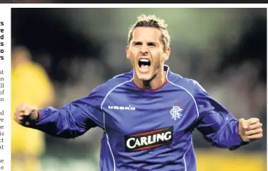  ??  ?? MAD FOR IT Ibrox hitman Lovenkrand­s celebrates his opener at El Madrigal before Boyd, main, is left dejected