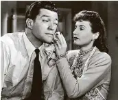  ?? Warner Bros. ?? Barbara Stanwyck uses a washcloth to dab Dennis Morgan’s face in the film, “Christmas in Connecticu­t,” airing on TCM tonight.