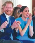  ??  ?? Prince Harry with wife Meghan Markle.