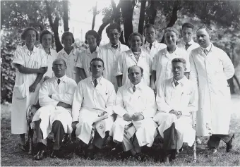  ??  ?? Hans Asperger, bottom right, with the staff of the Vienna Children’s Hospital, 1933
