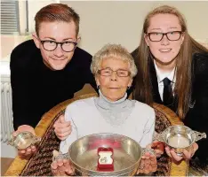  ??  ?? Relative achievemen­ts Airdrie Academy award winners Graham and Bethany Reid show off their awards with gran Margaret Toal