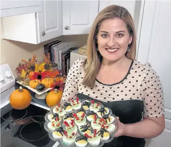  ?? PAUL PICKETT PHOTO ?? Aren’t they spooktacul­ar? Spider deviled eggs and devil deviled eggs. They almost look too good to eat. Almost.