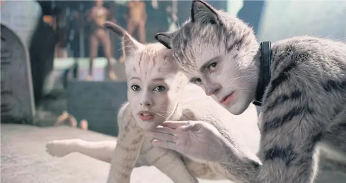  ??  ?? Francesca Hayward as Victoria, left, and Robbie Fairchild as Munkustrap in a scene from
Cats.