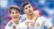  ?? GETTY IMAGES ?? ▪ Marco Asensio (right) celebrates a goal on Thursday.