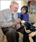  ?? Signal file photo ?? Bruce Fortine and Gloria MercadoFor­tine in their home with 8-year-old border collie Lexi in Santa Clarita.