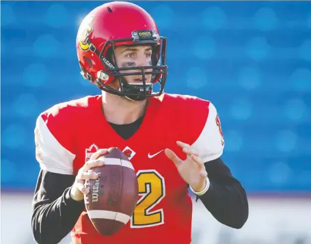  ?? JEFF MCINTOSH/THE CANADIAN PRESS ?? Adam Sinagra, who won a Vanier Cup and Hec Crighton Trophy as the University of Calgary Dinos’ starting QB, was bypassed in Thursday’s CFL draft.