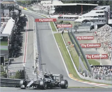  ?? Picture: Luca Bruno/ap ?? Nico Rosberg was quickest in practice at Spa yesterday despite a serious tyre failure