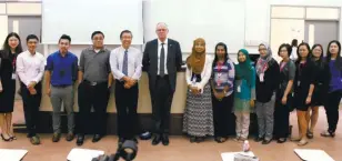  ??  ?? Pro-vice chancellor of ARU Dr Trevor Bolton with First City UC's staff.