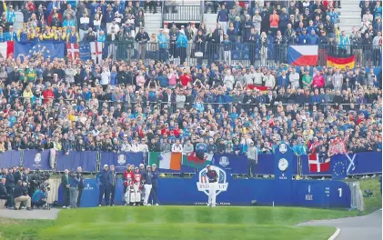  ?? Picture: Reuters ?? THEY’RE OFF! Team USA’s Tony Finau hits the first ball off the tee at the Ryder Cup yesterday.