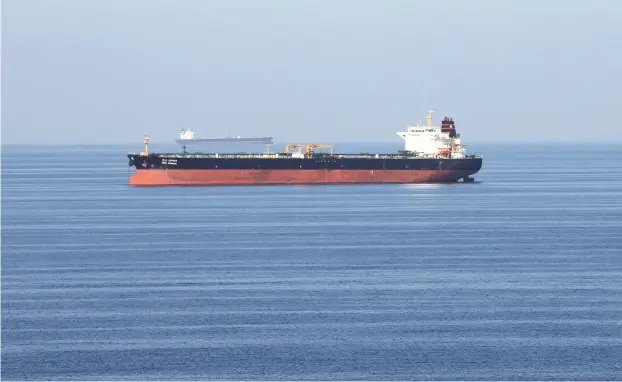  ?? (Hamad I Mohammed/Reuters) ?? OIL TANKERS pass through the Strait of Hormuz in 2018.