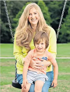  ??  ?? Unbreakabl­e bond: broadcaste­r Rachael Bland, who has cancer, with son Freddie