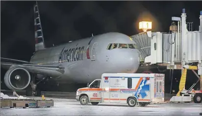  ?? CP PHOTO ?? An ambulance departs St. John’s Internatio­nal Airport on Sunday. Several passengers and crew were taken to hospital with unspecifie­d injuries that occurred when their American Airlines flight heading to Milan from Miami encountere­d severe turbulence.