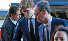  ?? SUSAN WALSH — THE ASSOCIATED PRESS ?? Alex van der Zwaan, second from left, arrives at Federal District Court in Washington, Tuesday.