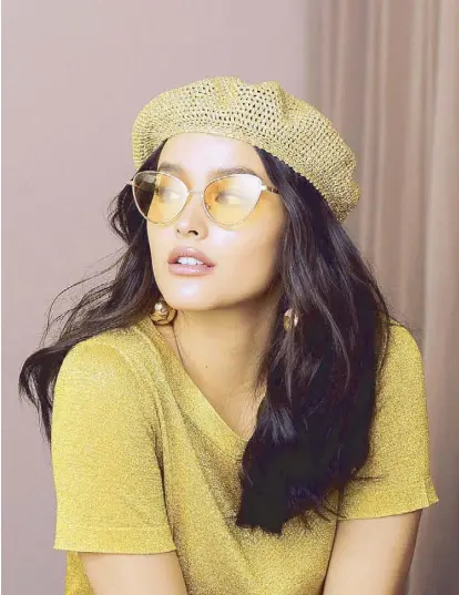  ??  ?? More than just a pretty face: Liza’s chill dispositio­n makes her the perfect Sunnies Studios muse.